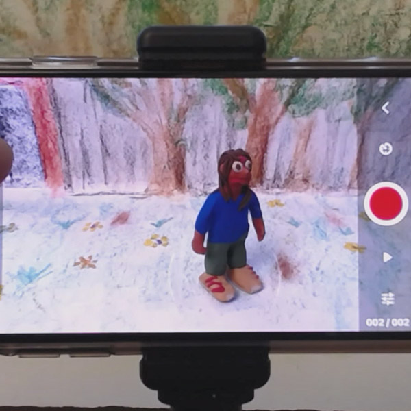 A stop-motion animation being filmed on a smartphone