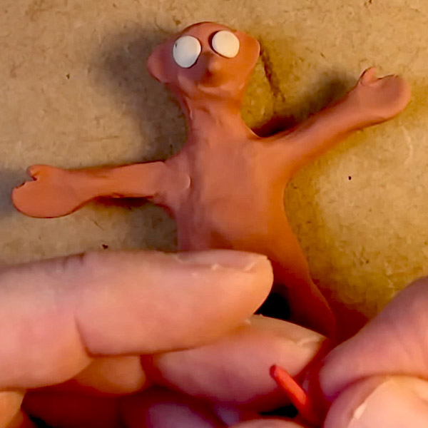 A character being made from plasticine